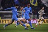 Juventus' Andrea Cambiaso is challenged by Napoli's Khvicha Kvaratskhelia, left, and Natan during the Serie A soccer match between Juventus and Napoli, at the Allianz stadium in Turin, Italy, Friday, Dec. 8, 2023. (Marco Alpozzi;/LaPresse via AP)