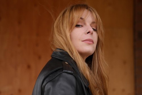 Sonja Mally misses her old life after being debilitated by long COVID for almost four years. Mally poses for a portrait in Toronto, Friday, Dec. 8, 2023. THE CANADIAN PRESS/Chris Young