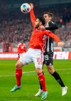 Berlin's Kevin Volland, left, and Monchengladbach's Max Wober battle for the ball during the Bundesliga soccer match between FC Union Berlin and Borussia Mönchengladbach at An der Alten Forsterei stadium, Berlin, Saturday Dec. 9, 2023. (Andreas Gora/dpa via AP)