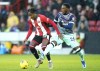Sheffield United's Andre Brooks, left, and Brentford's Shandon Baptiste battle for the ball during the English Premier League soccer match between Sheffield United and Brentford at Bramall Lane, Sheffield, England, Saturday Dec. 9, 2023. (Danny Lawson/PA via AP)