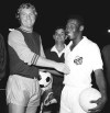 FILE -Soccer players Pele, right, and Bobby Moore meet before a game on Sept. 22, 1970 in Mexico. No player of Brazil’s Santos will wear the shirt the late Pelé made globally famous as long as the club plays in the country’s second division. Marcelo Teixeira, who was elected on Saturday, Dec. 9, 2023 as Santos’ new president, told journalists he made the decision as a tribute to the club’s biggest star. (AP Photo/File)