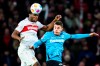 Stuttgart's Dan-Axel Zagadou, left, in action against Leverkusen's Patrik Schick during the Bundesliga soccer match between Bayer Leverkusen and VfB Stuttgart at MHP Arena stadium in Stuttgart, Germany, Sunday Dec. 10, 2023. (Tom Weller/dpa via AP)