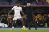 Roma's head coach Jose Mourinho, right, gives instructions during the Series A soccer match between Roma and Fiorentina at the Rome's Olympic stadium, Sunday, Dec. 10, 2023. (AP Photo/Gregorio Borgia)