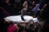 Palestinians mourn relatives killed in an Israeli bombardment of the Gaza Strip, outside a morgue in Kahn Younis on Monday, Dec. 11, 2023. (AP Photo/Mohammed Dahman)