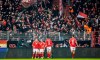 Union players cheer with the fans after the 3:0 goal during the Bundesliga soccer match between FC Union Berlin and Borussia Mönchengladbach at An der Alten Forsterei stadium, Berlin, Saturday Dec. 9, 2023. (Andreas Gora/dpa via AP)