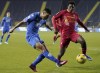 Empoli's Nicolo Cambiaghi, left, kicks the ball past Lecce's Patrick Chinazaekpere Dorgu during the Serie A soccer match between Empoli and Lecce at the Castellani stadium in Empoli, Italy, Monday, Dec. 11, 2023. (Marco Bucco/LaPresse via AP)