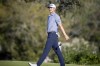 Mackenzie Hughes reacts to a missed birdie putt on the 16th green during the final round of the RSM Classic golf tournament, Sunday, Nov. 19, 2023, in St. Simons Island, Ga. (AP Photo/Stephen B. Morton)