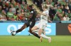 FILE - Nigeria's Asisat Oshoala, left, battles for the ball with Ireland's Amber Barrett during the Women's World Cup Group B soccer match between Ireland and Nigeria in Brisbane, Australia, on July 31, 2023. Victor Osimhen prepared for a key Champions League game Tuesday Dec. 12, 2023 by being named African player of the year for his goals that lifted Napoli to its first Italian league title in 33 years. The Nigeria forward was in Morocco on Monday evening to collect the prize at the Confederation of African Football awards, 24 hours before Napoli hosts Braga needing to avoid defeat to reach the Champions League round of 16. Nigeria completed a double victory as Asisat Oshoala won the best women’s player honor for a record sixth time. (AP Photo/Tertius Pickard, File)
