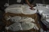 Palestinians mourn their relatives killed in the Israeli bombardment of the Gaza Strip, at the hospital Rafah, Gaza, Tuesday, Dec. 12, 2023. (AP Photo/Fatima Shbair)