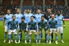 FILE - Israel players pose ahead of the Euro 2024 group I qualifying soccer match between Israel and Romania at the Pancho Arena in Felcsut, Hungary, on Nov. 18, 2023. German sportswear giant Puma says it took a decision in 2022 to end its collaboration with the Israeli soccer team next year for financial reasons. Puma communications chief Kerstin Neubers says the decision was already taken at the end of 2022 when the company decided to implement its “fewer-bigger-better strategy” and apply it to its marketing campaigns. (AP Photo/Denes Erdos, File)