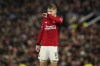 Manchester United's Rasmus Hojlund reacts after Bayern's Kingsley Coman scored his side's opening goal during the group A Champions League soccer match between Manchester United and Bayern Munich at the Old Trafford stadium in Manchester, England, Tuesday, Dec. 12, 2023. (AP Photo/Dave Thompson)