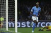 Napoli's Victor Osimhen celebrates scoring his side's second goal of the game during the Champions League group C soccer match between Napoli and Braga at the Diego Armando Maradona stadium in Naples, Italy, Tuesday, Dec. 12, 2023. (Alessandro Garofalo/LaPresse via AP)