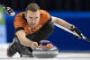 Wild Card 1 skip Brendan Bottcher against Ontario’s Mike McEwen during their 3/4 playoff game at the 2023 Tim Hortons Brier in London, Ont. on Saturday March 11, 2023.THE CANADIAN PRESS/Frank Gunn