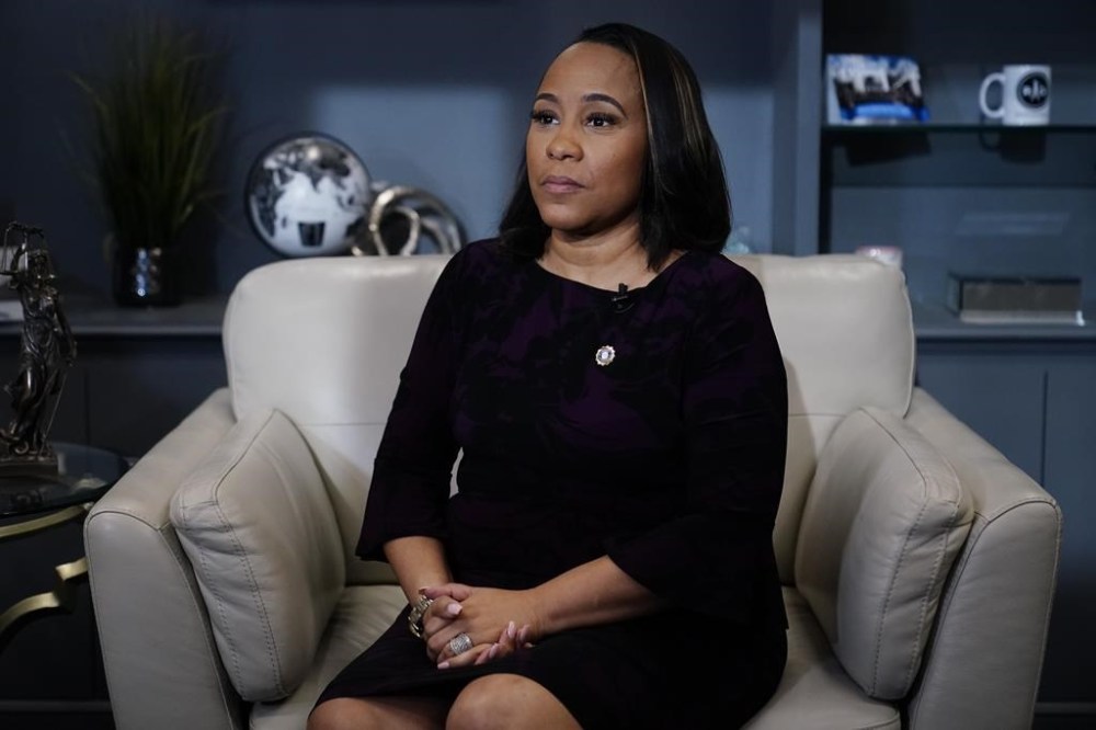 District Attorney for Fulton County, Fani Willis speaks during an Associated Press interview on Tuesday, Dec. 12, 2023, in Atlanta. (AP Photo/Brynn Anderson)