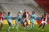 Royal Antwerp's Toby Alderweireld, center, eyes the ball during the Champions League Group H soccer match between Antwerp and Barcelona at the Bosuil stadium in Deurne, Belgium, Wednesday, Dec. 13, 2023. (AP Photo/Geert Vanden Wijngaert)