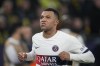 PSG's Kylian Mbappe celebrates after scoring a goal that was later disallowed during the Champions League Group F soccer match between Borussia Dortmund and Paris Saint-Germain at the Signal Iduna Park in Dortmund, Germany, Wednesday, Dec. 13, 2023. (AP Photo/Martin Meissner)