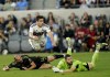 Vancouver Whitecaps forward Brian White, top watches his goal past Los Angeles FC defender Giorgio Chiellini, bottom left, and goalkeeper Maxime Crépeau during the first half of an MLS playoff soccer match Saturday, Oct. 28, 2023, in Los Angeles. THE CANADIAN PRESS/AP-Ryan Sun