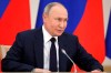 Russian President Vladimir Putin speaks during a meeting with judges of the Constitutional Court of the Russian Federation marking the national holiday celebrated on December 12 - Constitution Day, at the Novo-Ogaryovo State residence outside Moscow, Russia, Tuesday, Dec. 12, 2023. (Mikhail Tereshchenko, Sputnik, Kremlin Pool Photo via AP)