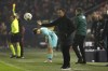 Barcelona's head coach Xavi Hernandez tosses the ball during the Champions League Group H soccer match between Antwerp and Barcelona at the Bosuil stadium in Deurne, Belgium, Wednesday, Dec. 13, 2023. (AP Photo/Geert Vanden Wijngaert)