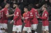 PSV's Yorbe Vertessen, right, celebrates with his teammates after scoring against Arsenal during the Champions League, Group B soccer match between PSV Eindhoven and Arsenal, at Philips stadium in Eindhoven, Netherlands, Tuesday, Dec. 12, 2023. (AP Photo/Patrick Post)