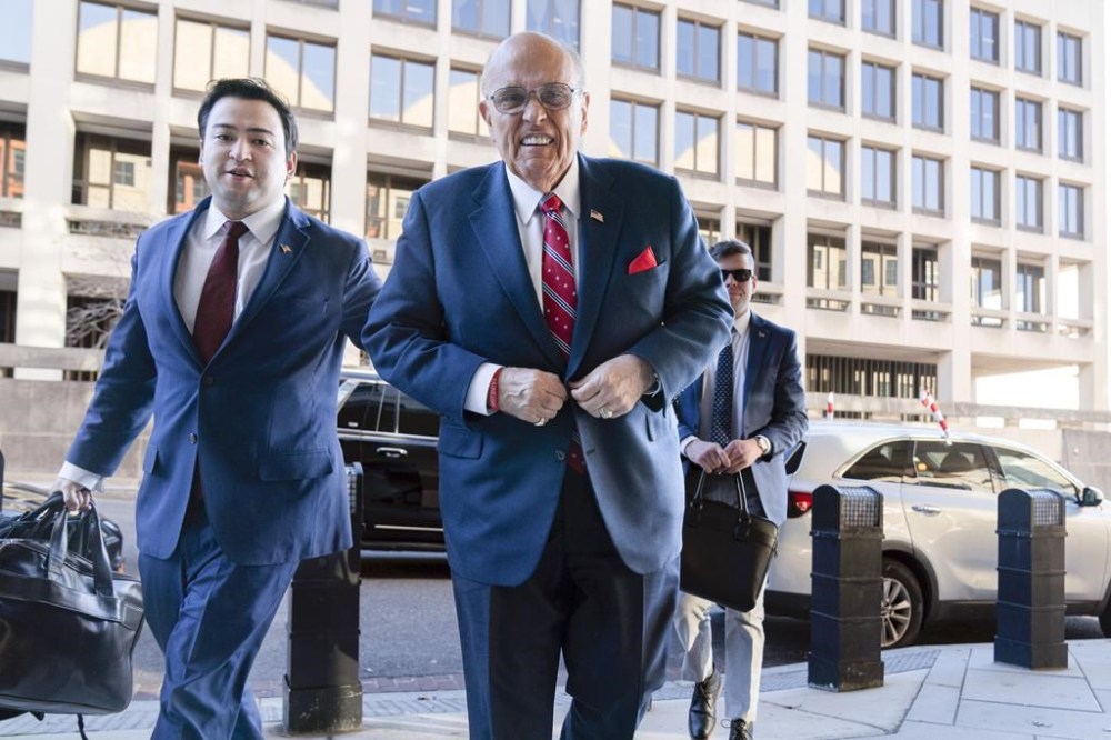 Former Mayor of New York Rudy Giuliani arrives at the federal courthouse in Washington, Thursday, Dec. 14, 2023. (AP Photo/Jose Luis Magana)