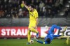 Rennes' goalkeeper Steve Mandanda makes a save past Villarreal's Ben Brereton Diaz during the Europa League Group F soccer match between Rennes and Villarreal at the Roazhon Park stadium in Rennes, western France, Thursday, Dec. 14, 2023. (AP Photo/Christophe Ena)