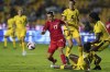 Canada's Jessie Fleming challenges for the ball against Jamaica's Deneisha Blackwood, bottom, and Vyan Sampson during a CONCACAF Women's Championship soccer semifinal match in Monterrey, Mexico, Thursday, July 14, 2022. THE CANADIAN PRESS/AP/Fernando Llano