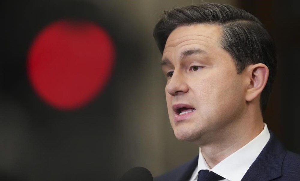 Conservative Leader Pierre Poilievre speaks to reporters in the foyer of the House of Commons on Parliament Hill in Ottawa on Monday, Nov. 6, 2023. THE CANADIAN PRESS/Sean Kilpatrick
