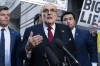 Former Mayor of New York Rudy Giuliani speaks during a news conference outside the federal courthouse in Washington, Friday, Dec. 15, 2023. A jury awarded $148 million in damages on Friday to two former Georgia election workers who sued Giuliani for defamation over lies he spread about them in 2020 that upended their lives with racist threats and harassment. (AP Photo/Jose Luis Magana)