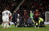 Luton Town manager Rob Edwards on the pitch as his player Tom Lockyer receives treatment during the English Premier League soccer match between Bournemouth and Luton Town at the Vitality Stadium, in Bournemouth, England, Saturday, Dec. 16, 2023. (Steven Paston/PA via AP)