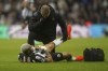 Newcastle United's Joelinton receives treatment, during the English Premier League soccer match between Newcastle United and Fulham, at St. James' Park, in Newcastle upon Tyne, England, Saturday, Dec. 16, 2023. (Owen Humphreys/PA via AP)