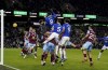 Everton's Amadou Onana scores the opening goal during the English Premier League soccer match between Burnley and Everton at Turf Moor, Burnley, England, Saturday Dec. 16, 2023. (Nick Potts/PA via AP)