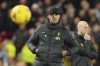 Liverpool's manager Jurgen Klopp watches the English Premier League soccer match between Liverpool and Manchester United at the Anfield stadium in Liverpool, England, Sunday, Dec.17, 2023. (AP Photo/Jon Super)