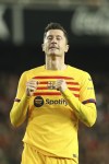 Barcelona's Robert Lewandowski reacts during the Spanish La Liga soccer match between Villarreal and Barcelona at the Mestalla stadium in Valencia, Spain, Saturday, Dec. 16, 2023. (AP Photo/Alberto Saiz)