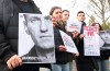 FILE - Demonstrators gather outside the home of Russian ambassador Sergei Netshaev in Berlin, Saturday Dec. 16, 2023, demanding the freedom for all political prisoners in Russia, including Alexei Navalny. Allies of the imprisoned Russian opposition leader Alexei Navalny say they are searching for him for a 13th day after he failed to appear in court. Navalny’s spokesperson wrote on social media that that Navalny had multiple hearings scheduled Monday, Dec. 18, 2023. (Paul Zinken/dpa via AP, File)