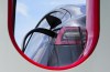 An electric vehicle is charged in Ottawa on Wednesday, July 13, 2022. Auto manufacturers will have three years to start showing a sizable increase in electric vehicle sales as the federal government moves to finalize its new EV mandate this week. THE CANADIAN PRESS/Sean Kilpatrick