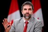 Minister of Environment and Climate Change Steven Guilbeault speaks during a news conference in Ottawa, on Monday, Nov. 20, 2023. Guilbeault will outline today the details of his plan to eventually phase out the sale of gas-powered vehicles in Canada. THE CANADIAN PRESS/Justin Tang