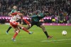 Bayern's Thomas Mueller scores a goal that was later disallowed by a VAR decision during the German Bundesliga soccer match between Bayern Munich and Stuttgart in Munich, Germany, Sunday, Dec. 17, 2023. (AP Photo/Matthias Schrader)