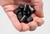 Nuclear Waste Management Organization senior transportation engineer Ulf Stahmer holds enough model uranium pellets to power a house for a year during a tour of NWMO's facility in Oakville, Ont., on Tuesday, December 12, 2023. THE CANADIAN PRESS/Frank Gunn