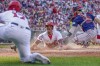 FILE - Washington Nationals' Jeter Downs slides across home plate to score on a double by Washington Nationals' Joey Meneses to take the lead during the fifth inning of a baseball game against the Boston Red Sox at Nationals Park, Thursday, Aug. 17, 2023, in Washington. Jeter is back with the Yankees — Jeter Downs. New York has claimed the 25-year-old shortstop off waivers from the Washington Nationals. (AP Photo/Andrew Harnik, File)