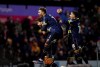Middlesbrough's Matt Crooks, bottom left, celebrates after scoring their side's third goal of the game during the English League Cup quarter final soccer match against Port Vale at Vale Park, Stoke-on-Trent, England, Tuesday, Dec. 19, 2023. (Nick Potts/PA via AP)