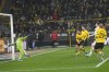 Dortmund's Giovanni Reyna, center, scores on a goal which was later disallowed due to an offside call during the German Bundesliga soccer match between Borussia Dortmund and 1. FSV Mainz 05 at the Signal-Iduna Park in Dortmund, Germany, Tuesday, Dec. 19, 2023. (AP Photo/Martin Meissner)