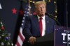 FILE - Former President Donald Trump speaks during a commit to caucus rally, Tuesday, Dec. 19, 2023, in Waterloo, Iowa. Republican U.S. Senate candidate Bernie Moreno has landed Donald Trump's endorsement in the GOP race for a 2024 contender to unseat third-term Democrat Sherrod Brown, one of his party's most vulnerable incumbents. The former president and 2024 presidential candidate backed Moreno, a wealthy Cleveland businessman, in a post on his social media network, Truth Social, Tuesday. (AP Photo/Charlie Neibergall, File)