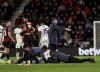 Luton Town manager Rob Edwards gestures on the pitch as his player Tom Lockyer receives treatment on the pitch during the English Premier League soccer match between Bournemouth and Luton Town at the Vitality Stadium, in Bournemouth, England, Saturday, Dec. 16, 2023. (Steven Paston/PA via AP)