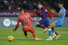 Barcelona's Sergi Roberto, centre, scores his side's third goal during the Spanish La Liga soccer match between Barcelona and Almeria at the Olimpic Lluis Companys stadium in Barcelona, Spain, Wednesday, Dec. 20, 2023. (AP Photo/Joan Monfort)