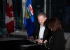 Canada's Minister of Health Mark Holland signs an agreement with Adriana LaGrange, minister of health for Alberta, in Calgary on Thursday, Dec. 21, 2023. THE CANADIAN PRESS/Todd Korol