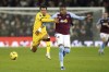 Sheffield United's Cameron Archer, left, and Aston Villa's Ezri Konsa, right, challenge for the ball during the English Premier League soccer match between Aston Villa and Sheffield United at Villa Park in Birmingham, England, Friday, Dec. 22, 2023. (Mike Egerton/PA via AP)