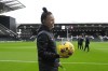 Referee Rebecca Welch walks around the field during a pitch inspection before the English Premier League soccer match between Fulham and Burnley at Craven Cottage stadium in London, Saturday, Dec. 23, 2023. Welch is the first female referee ever to officiate an English Premier League game. (AP Photo/Alastair Grant)