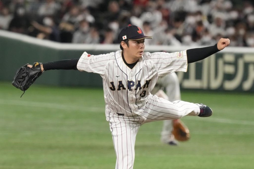 Japan relief pitcher Yuki Matsui throws during the eighth inning of the first round Pool B game between South Korea and Japan at the World Baseball Classic at Tokyo Dome in Tokyo on March 10, 2023. Matsui agreed Saturday, Dec. 23, to a five-year contract with the San Diego Padres. The 28-year-old left-hander was a five-time All-Star in Japan for the Tohoku Rakuten Golden Eagles, leading the Pacific League in saves in 2019, 2022 and this year. (AP Photo/Eugene Hoshiko, File)