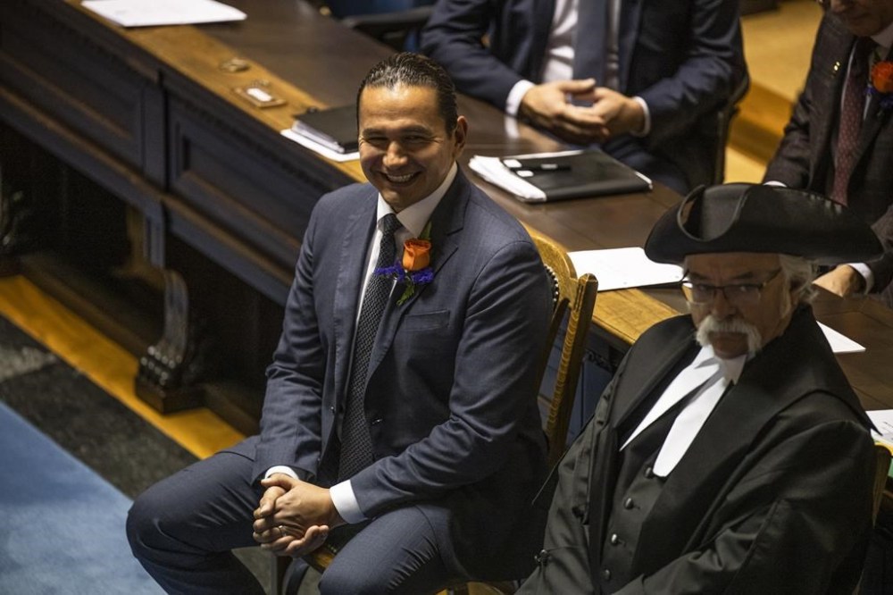 As Manitoba's first premier from the millennial generation, Wab Kinew is familiar with, and a big believer in, the reach of social media. Kinew is seen in the legislative assembly at the Manitoba Legislative Building in Winnipeg on Tuesday, Nov. 21, 2023. THE CANADIAN PRESS/Aaron Vincent Elkaim